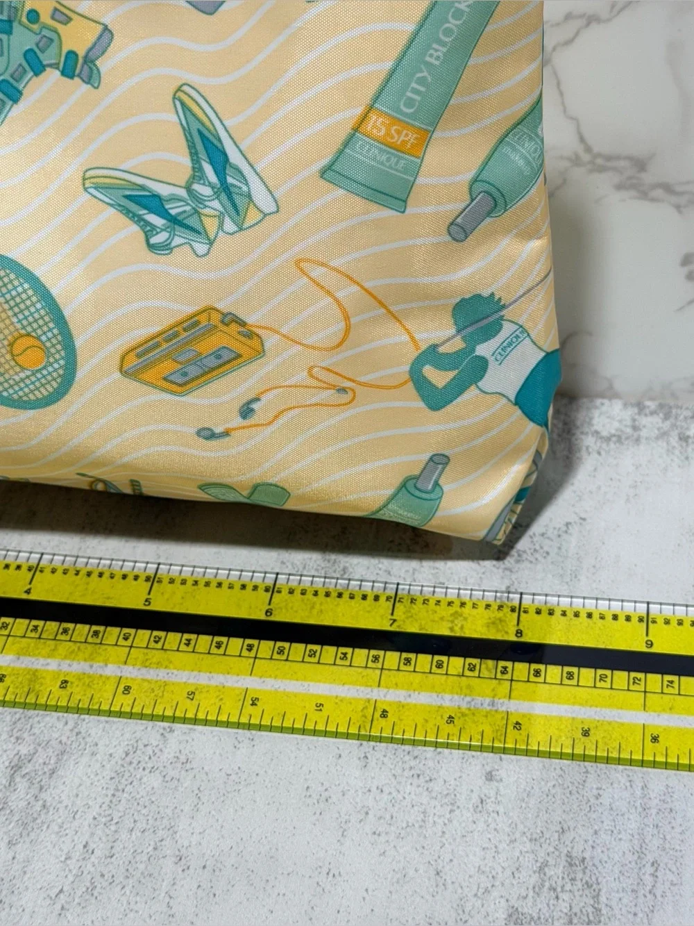CLINIQUE Yellow & Teal Tennis Graphic Cosmetic Pouch